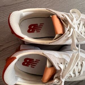 White and Orange Sneakers